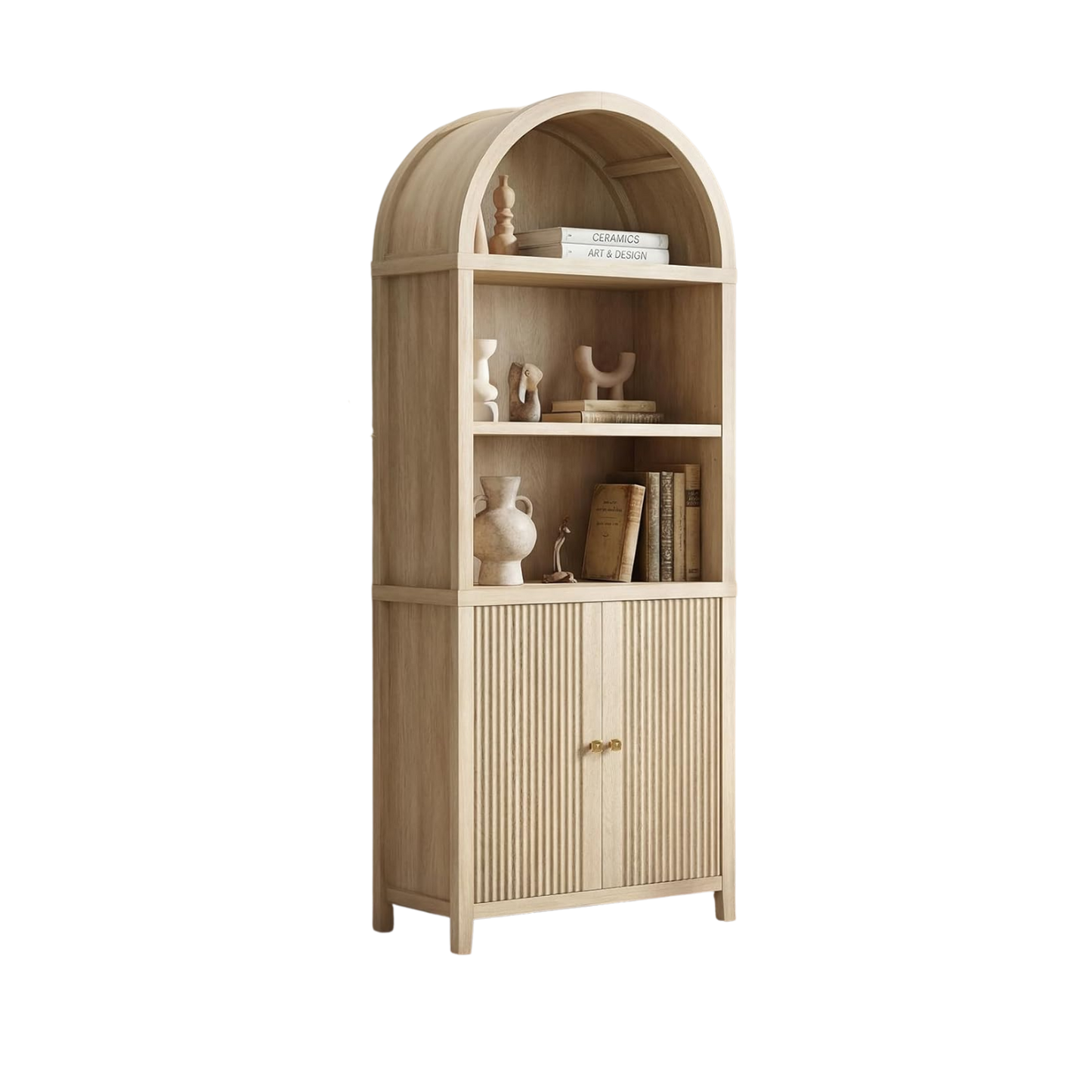 Tall arched cabinet has two open shelves above a ribbed two-door compartment, Books and small decorative objects occupy the shelves
