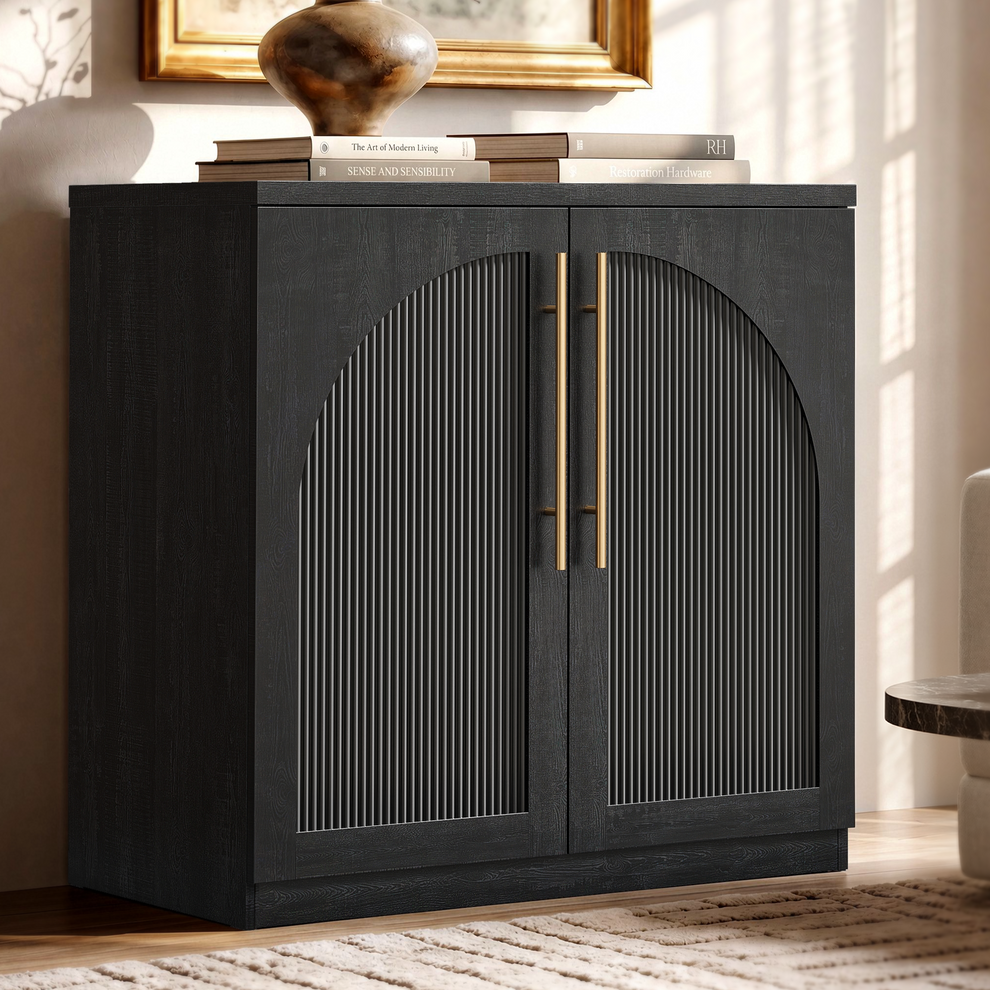 The cabinet front has two doors with arched-top ribbed insets and two long vertical pulls