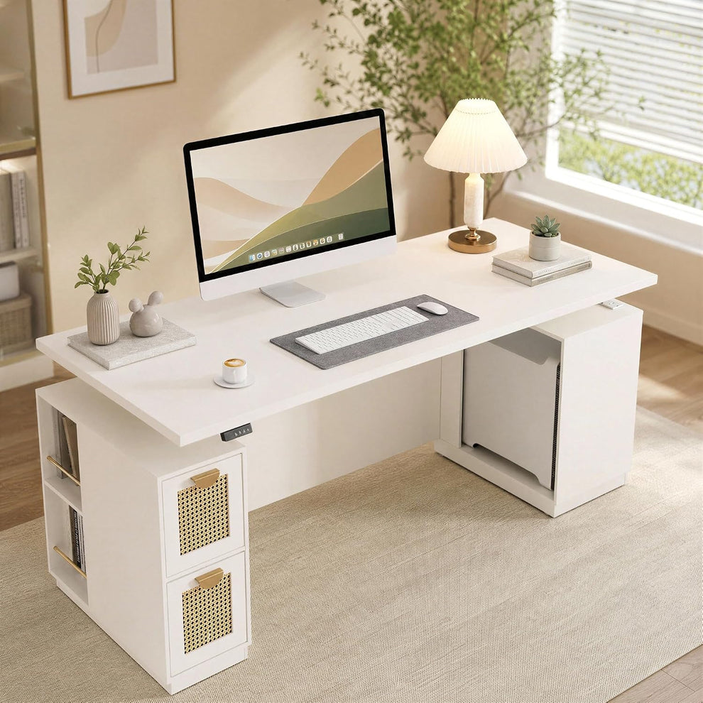 White desk with two gold-patterned drawer fronts, side shelves and an open compartment, topped with a computer, keyboard, mouse, pleated lamp, plants and a cup.