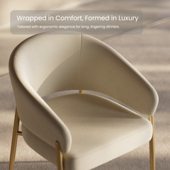 Cream upholstered dining chair with a curved back and gold-tone legs.