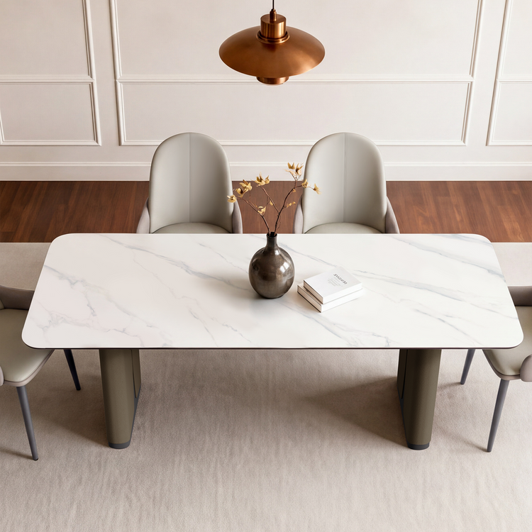 Overhead view of a rectangular dining table surrounded by four chairs