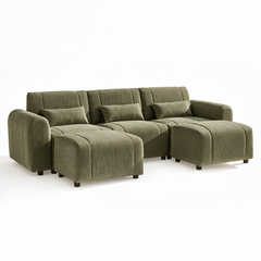 Olive-green sofa with three back cushions, three rectangular pillows, rounded arms and two matching ottomans positioned in front.