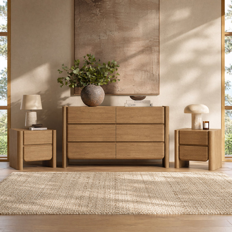 A six-drawer dresser stands between two matching two-drawer nightstands