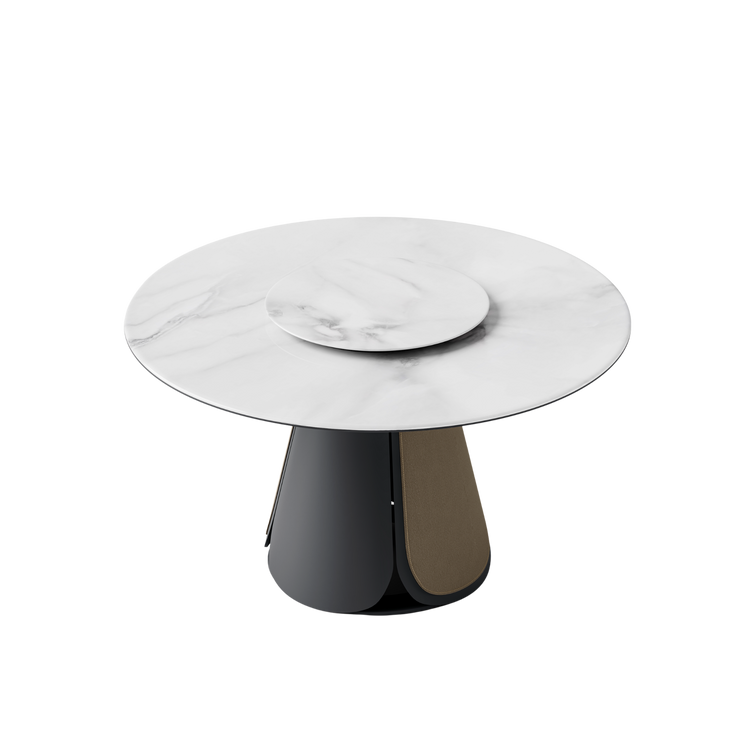 The round tabletop includes a smaller raised circular disk at its center and rests on a dark sculptural pedestal base