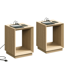 Two open-cubby wood-grain tables stand against a black background, Each tabletop supports two devices beside paired arched cables