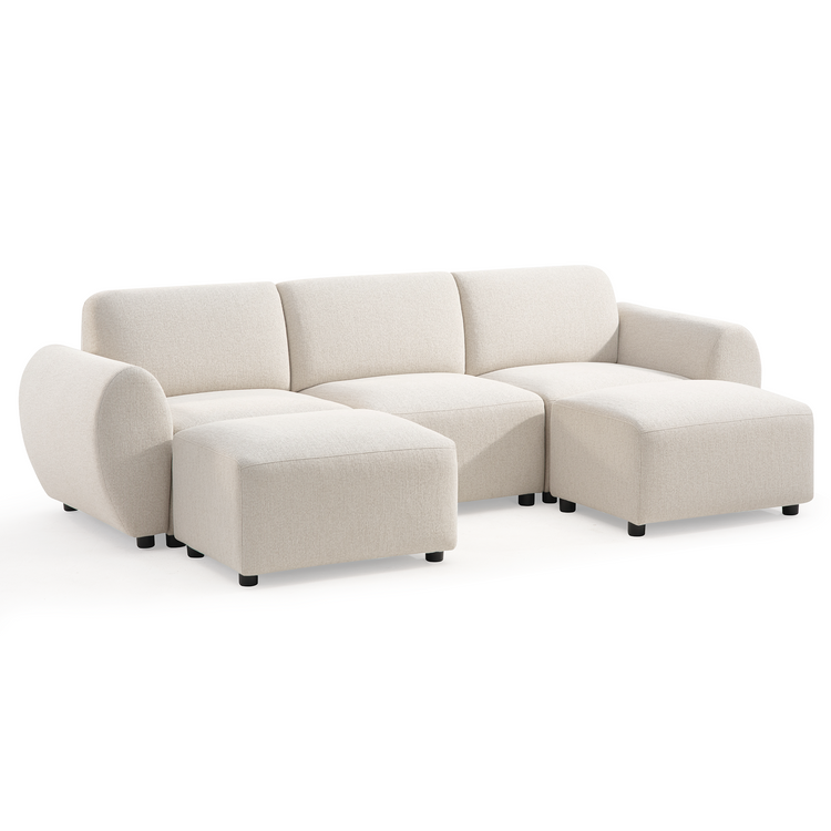 Cream-colored sofa with three back cushions, rounded arms and short black feet, with two matching rectangular ottomans positioned in front of the outer seats.