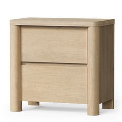 Light wood cabinet has two handleless drawers and rounded front posts