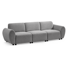 Gray three-seat sofa with three padded backrests, rounded arms, textured upholstery and short black legs, shown against a white background.