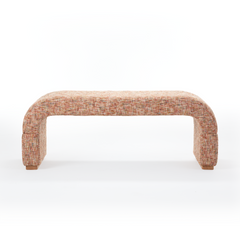 Backless bench has rounded sides and multicolor textured upholstery