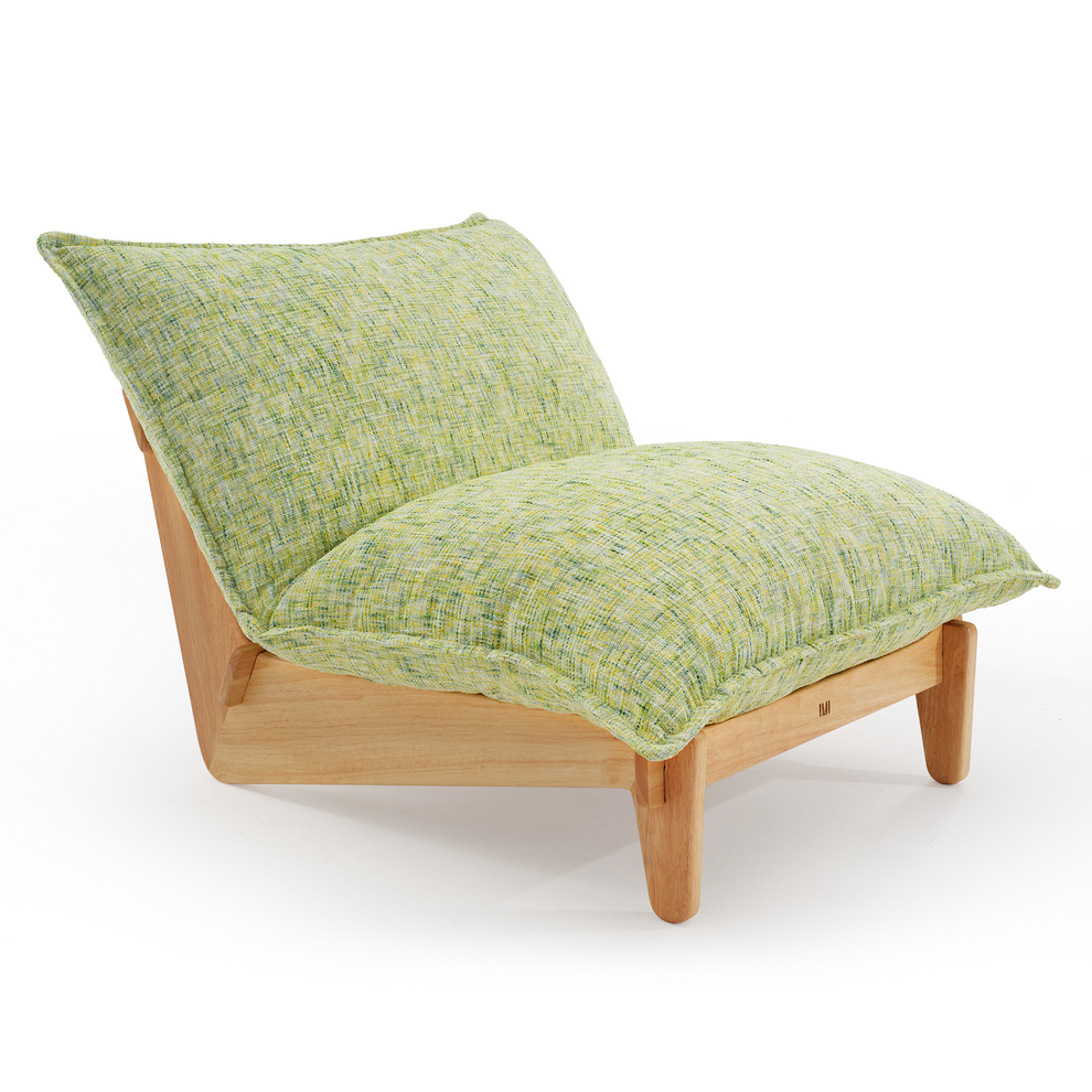 Armless lounge chair with a light brown frame, short rounded legs, and thick seat and back cushions in a textured pale green and yellow pattern.