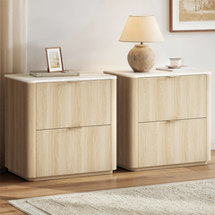 Two matching light wood-grain cabinets have rounded corners, Each front has two broad panels with slim pulls
