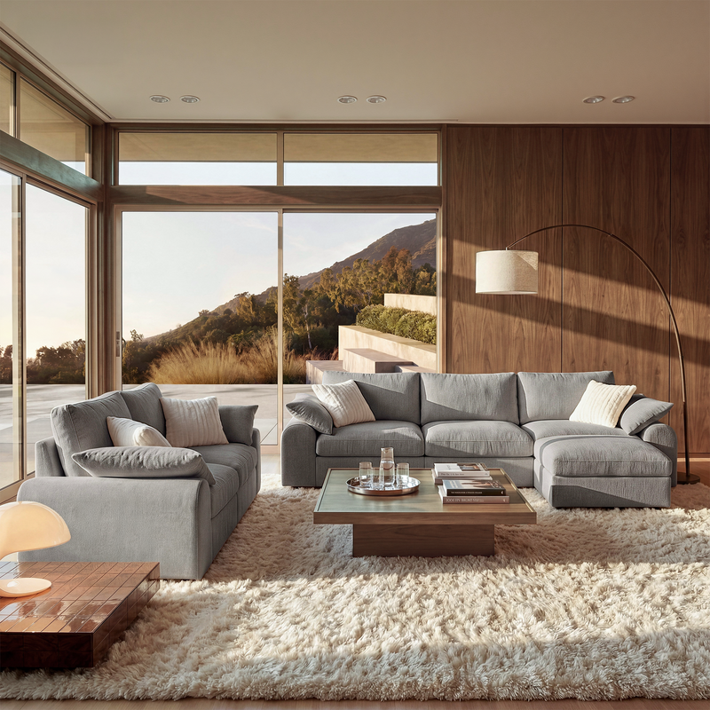 Gray L-shaped sofa and loveseat with cushions in a modern living room