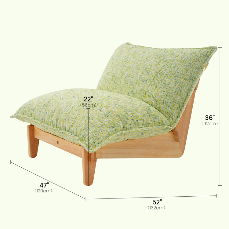 Dimension diagram of an armless lounge chair with a light brown frame, pale green textured seat and back cushions, and measurement lines for height, width, depth and seat height.