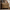 Light wood nightstand with two curved-front drawers beside a sofa