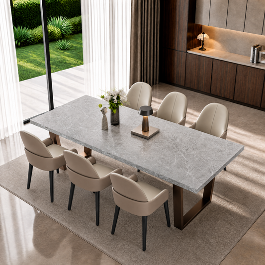 Rectangular gray marble-look dining table with bronze-tone U-shaped legs and six chairs