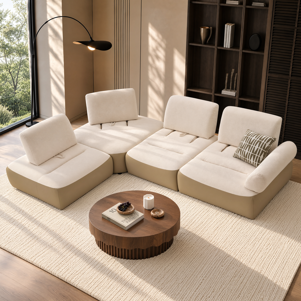 Cream and tan modular floor sofa arranged around a round wooden coffee table.