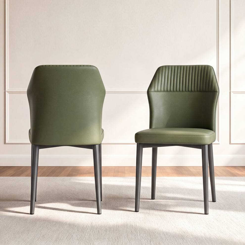 Two green dining chairs with vertically stitched upper backs and dark legs, shown from the front and rear
