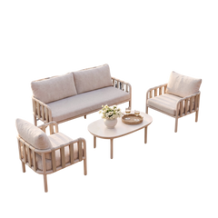 Cutout outdoor set with one sofa, two chairs, and a central coffee table on black