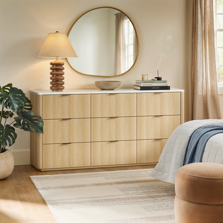 Light wood-toned dresser with rounded corners in a bedroom