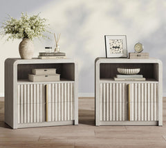 Two pale wood-grain nightstands with open cubbies, fluted drawers and rounded top corners arranged side by side