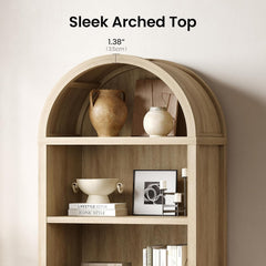 Arched wood-toned bookshelf styled with books and vases