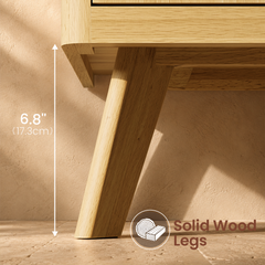 A light woodgrain angled leg supports the cabinet frame, Leg clearance height is 6.8 inches