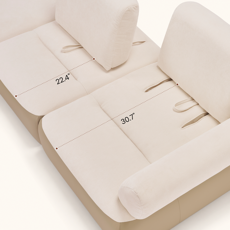 Dimension graphic showing labeled sections of a light upholstered sofa seat.