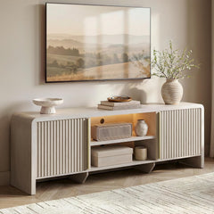 White fluted media console shown in a living room