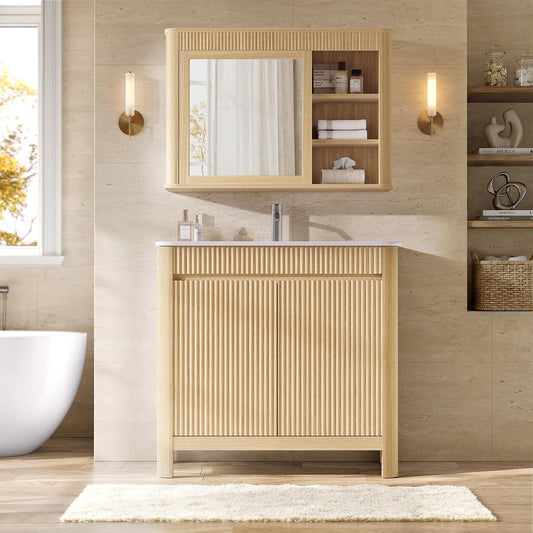 Freestanding fluted wood-tone vanity and matching mirror cabinet with open side shelves against a beige bathroom wall