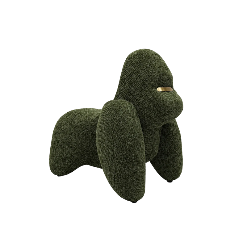 Forest green textured gorilla-shaped ottoman with a small gold accent on its face.