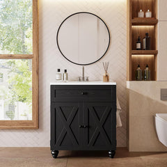 Black bathroom vanity with a white sink top, X-panel double doors and turned feet beneath a round mirror