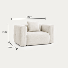 Dimension graphic of a cream upholstered armchair with three labeled measurements.