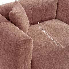 Close-up of a reddish-brown upholstered seat with a labeled lounge-depth dimension.