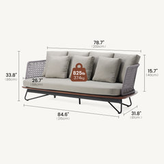 A cushioned sofa has open woven side panels, multiple back pillows, and an angular base