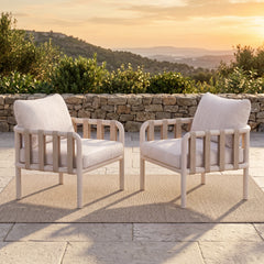 Two outdoor armchairs shown in an outdoor setting