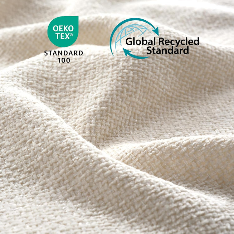 Close-up of cream-colored textured fabric in folds, with OEKO-TEX Standard 100 and Global Recycled Standard logos overlaid near the top.
