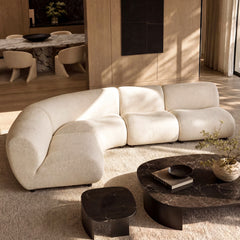 Cream modular sofa shown in a living room