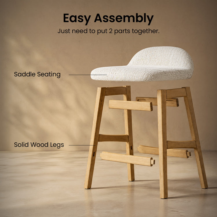 Exploded assembly diagram of a stool with a white textured seat and low curved back above a tan four-legged frame with separated horizontal supports.