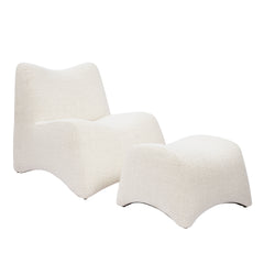 Two cream lounge chairs shown on a plain background