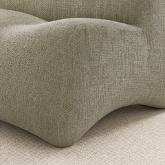 Olive-gray woven upholstery covers a softly curved padded edge