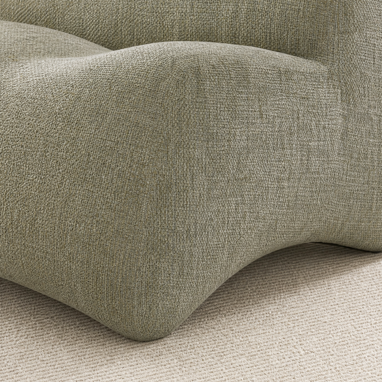 Olive-gray woven upholstery covers a softly curved padded edge
