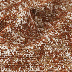 Rust, cream, and tan woven fabric has a nubby textured surface