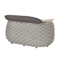 Gray chunky woven chair shown from the rear