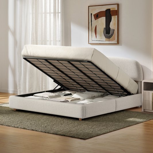 Light grey storage bed with a raised slatted mattress platform and divided bedding compartments on a green rug