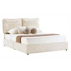 One bed is shown from a front three-quarter angle, The headboard is divided into two broad padded panels