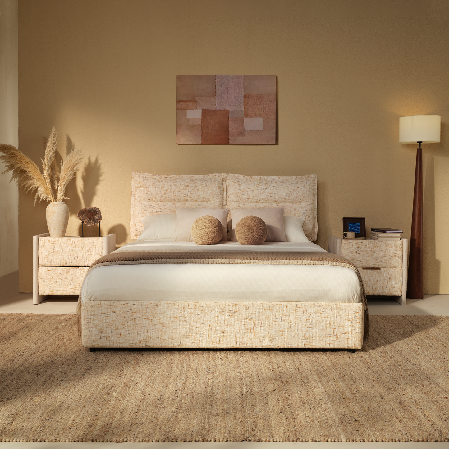 Cream upholstered bed shown in a bedroom