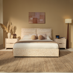 Cream upholstered bed shown in a bedroom
