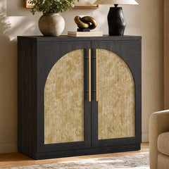 Black wood-grain cabinet with pale mottled arched fluted door panels and gold-tone handles in a living room