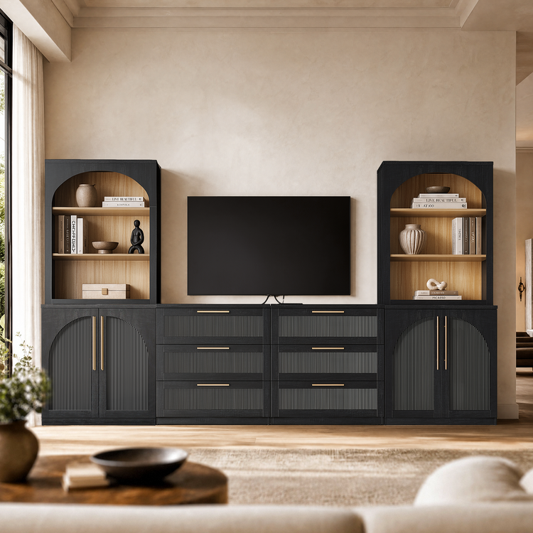 A coordinated dark media console and two tall arched cabinets surround a wall-mounted television