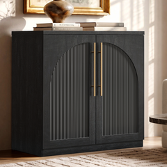 The cabinet front has two doors with arched-top ribbed insets and two long vertical pulls